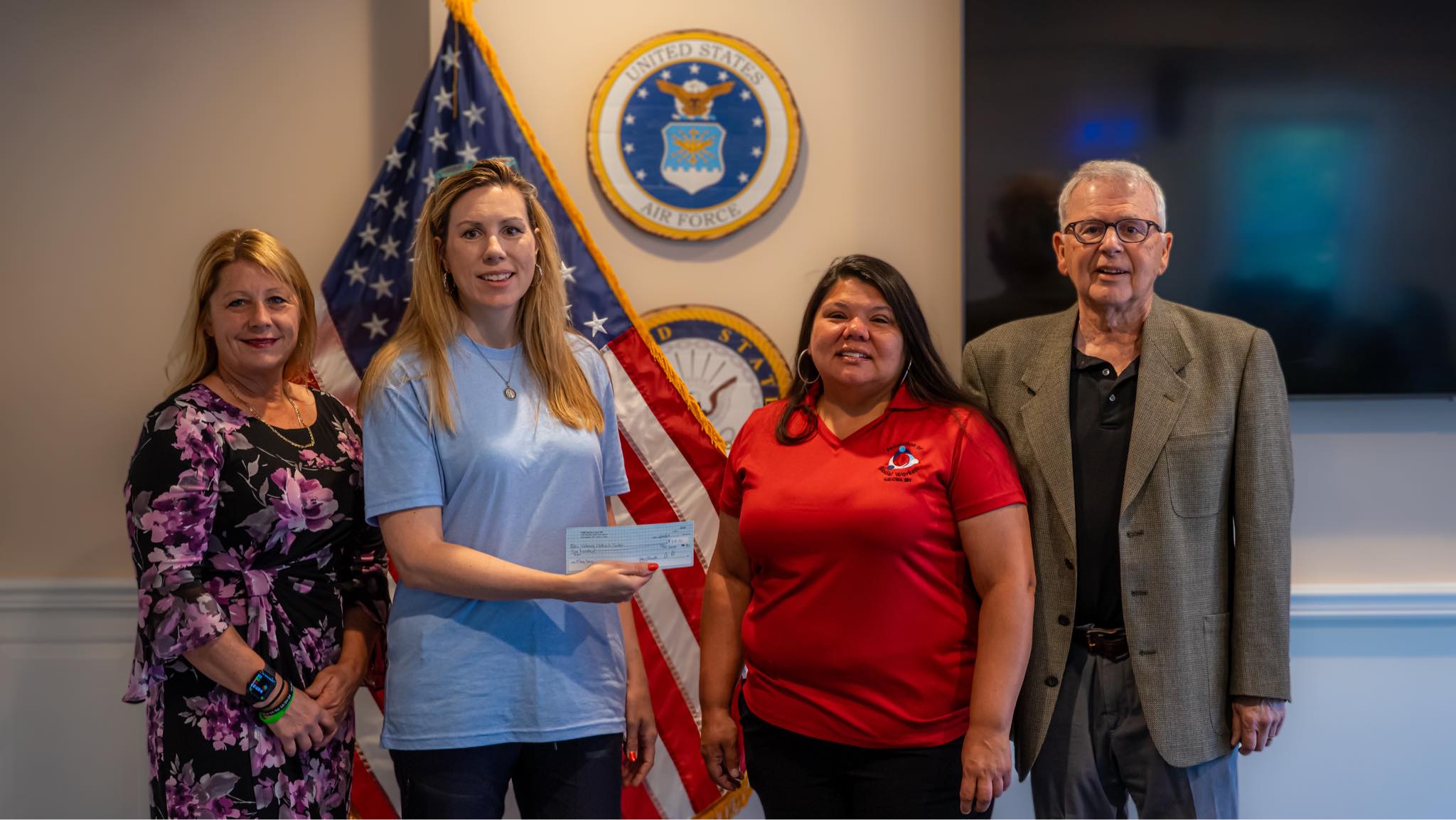 FSW presents check to Veterans Outreach Center